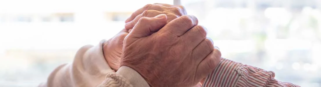 Hands folded in prayer